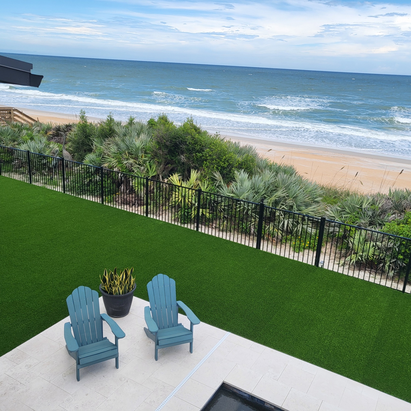 Atlantic shoreline and lawn at Salty Dog Lodge